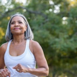 Woman going for a light jog in the park.