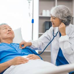 Man checked by doctor at hospital